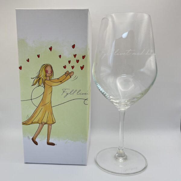 Vinglass fra Lykketegning "Fyll livet med det som godt er!